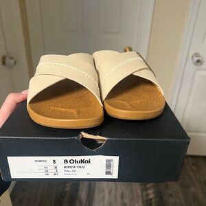 Olukai 
New with tags and box